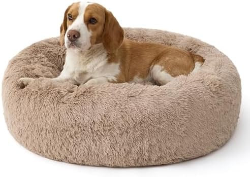 Calming faux fur donut dog bed